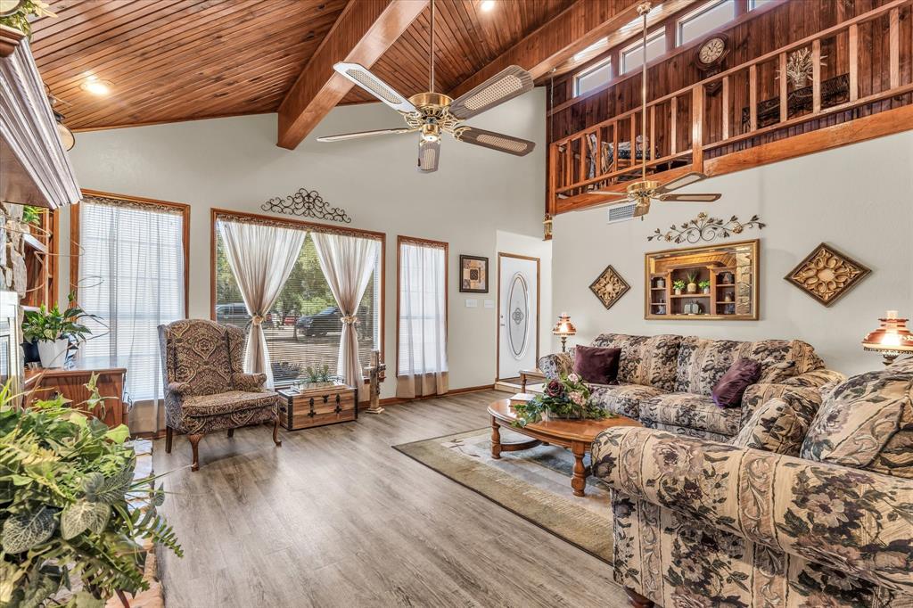 Vaulted wood-paneled ceiling with exposed beams