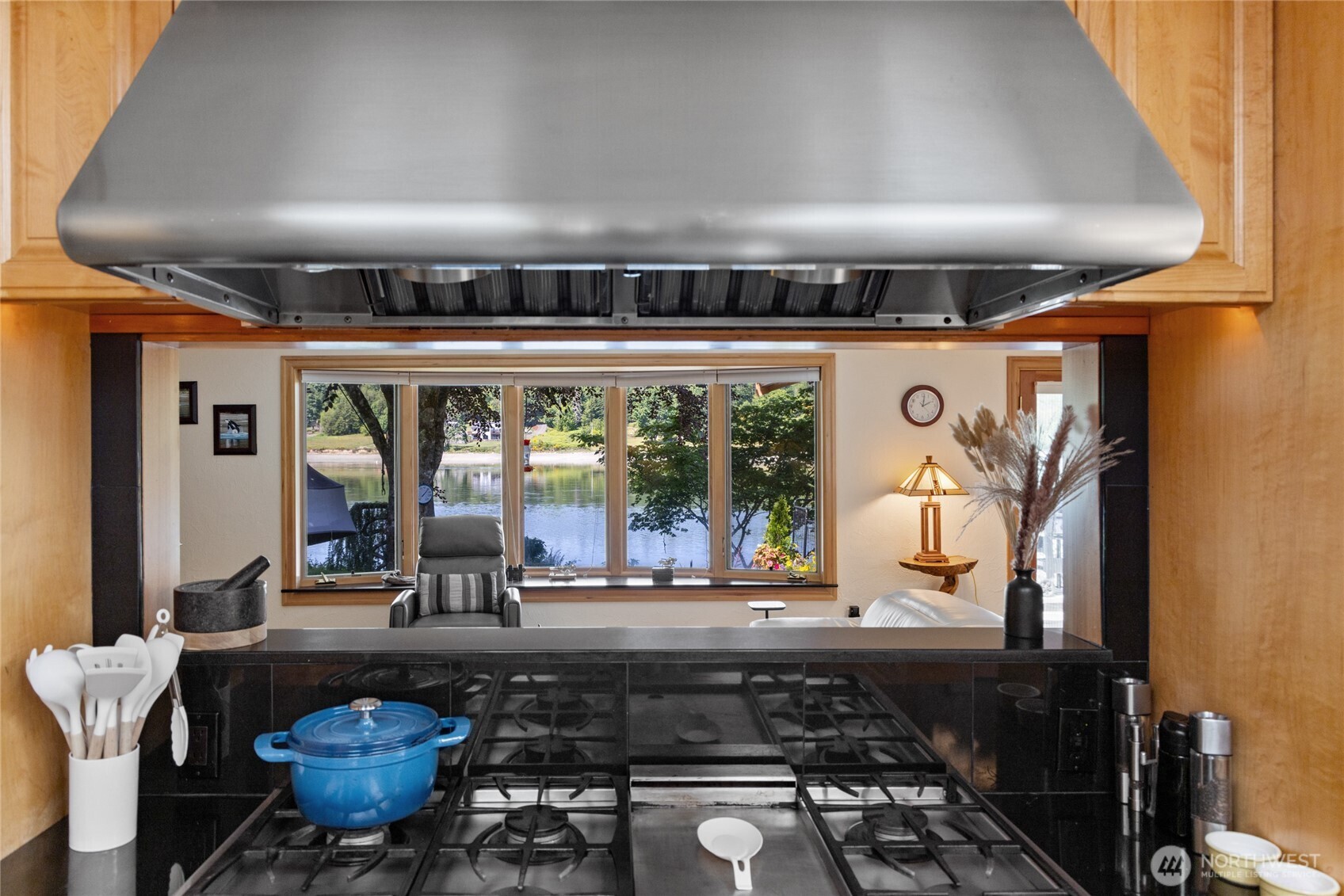 295 Southeast Bayview Road Shelton, WA 98584 - Photo 17 of 40 a living room with furniture a rug and white walls