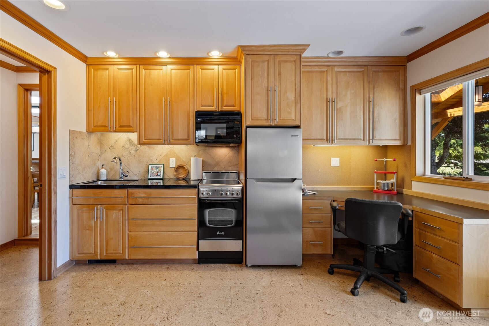295 Southeast Bayview Road Shelton, WA 98584 - Photo 20 of 40 a kitchen with stainless steel appliances a refrigerator and a stove top oven
