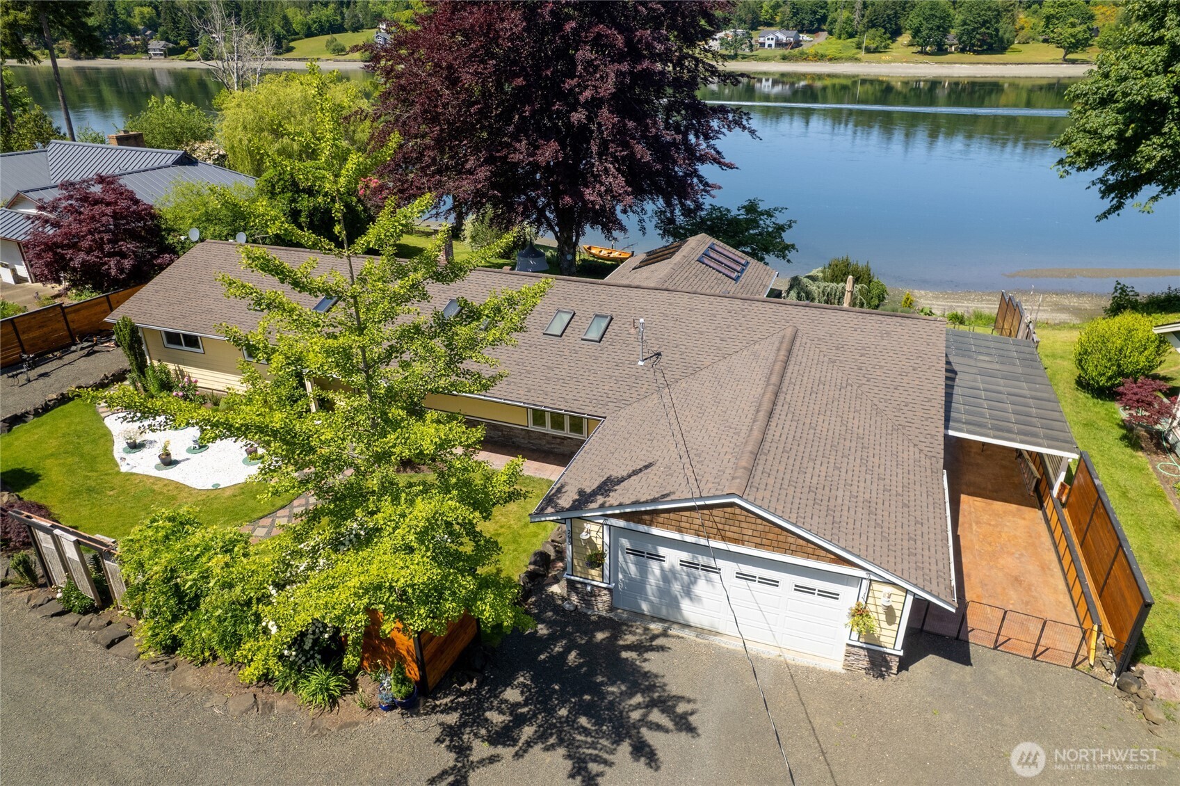295 Southeast Bayview Road Shelton, WA 98584 - Photo 2 of 40 an aerial view of a house with a lake view