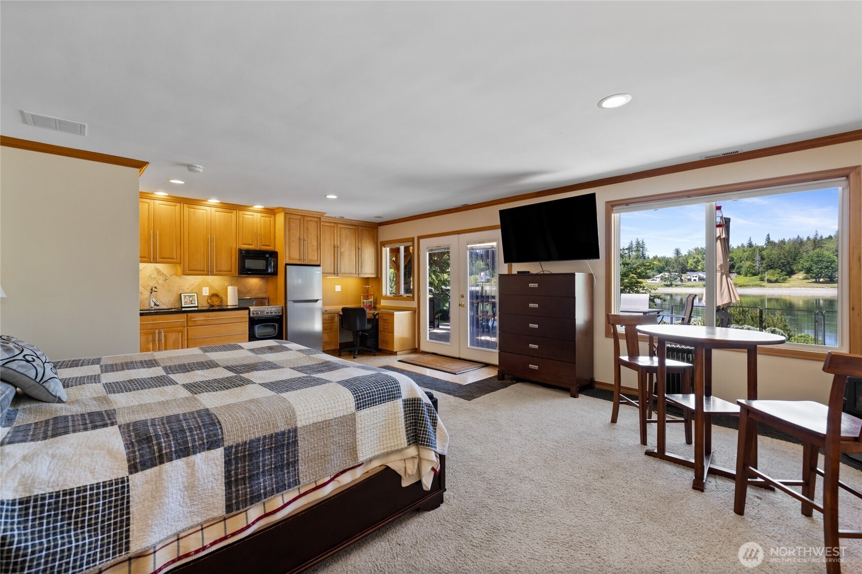 295 Southeast Bayview Road Shelton, WA 98584 - Photo 21 of 40 a bedroom with a bed and furniture