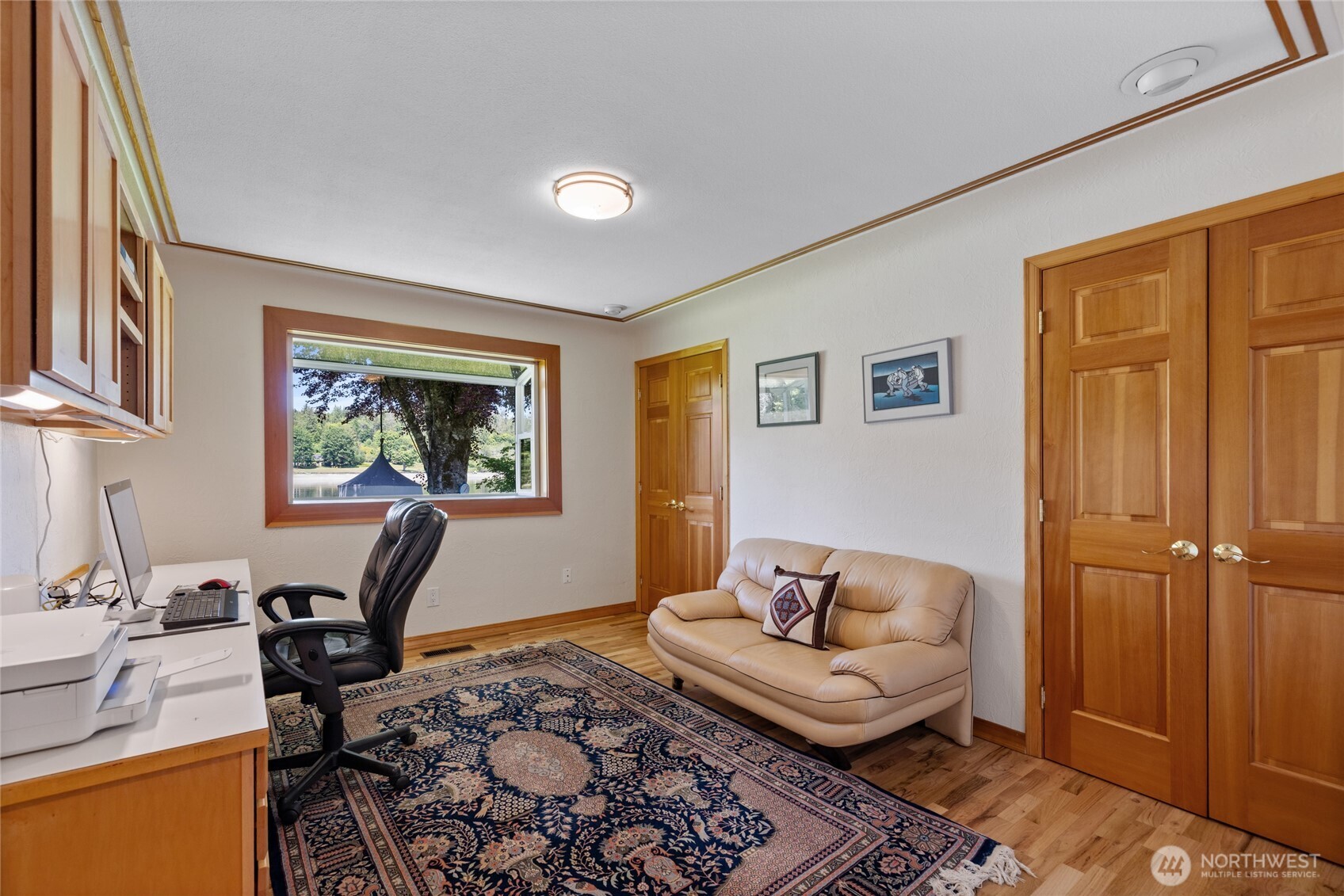 295 Southeast Bayview Road Shelton, WA 98584 - Photo 26 of 40 a living room with furniture and a window