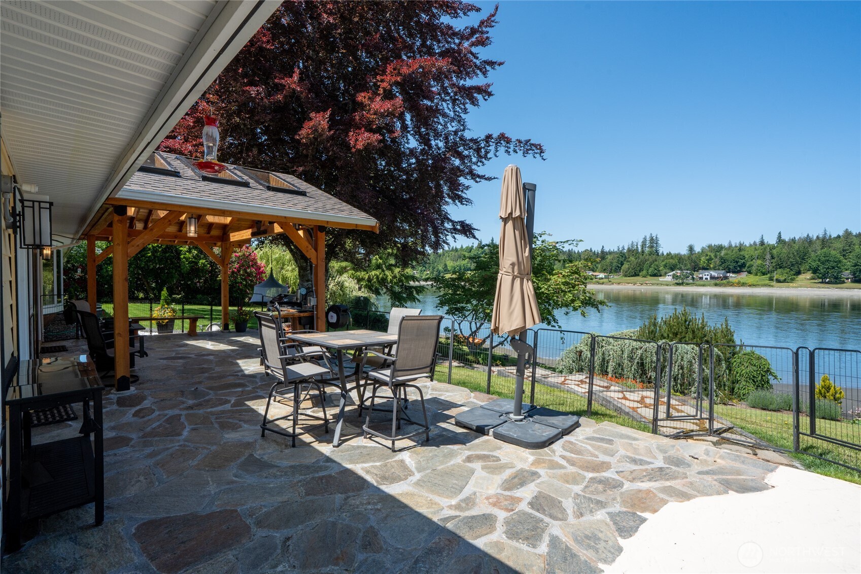 295 Southeast Bayview Road Shelton, WA 98584 - Photo 30 of 40 a view of a patio with chairs and plants