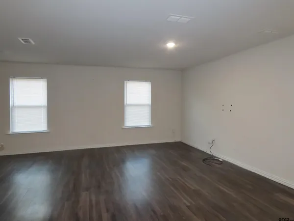 a kitchen with a refrigerator stove and microwave