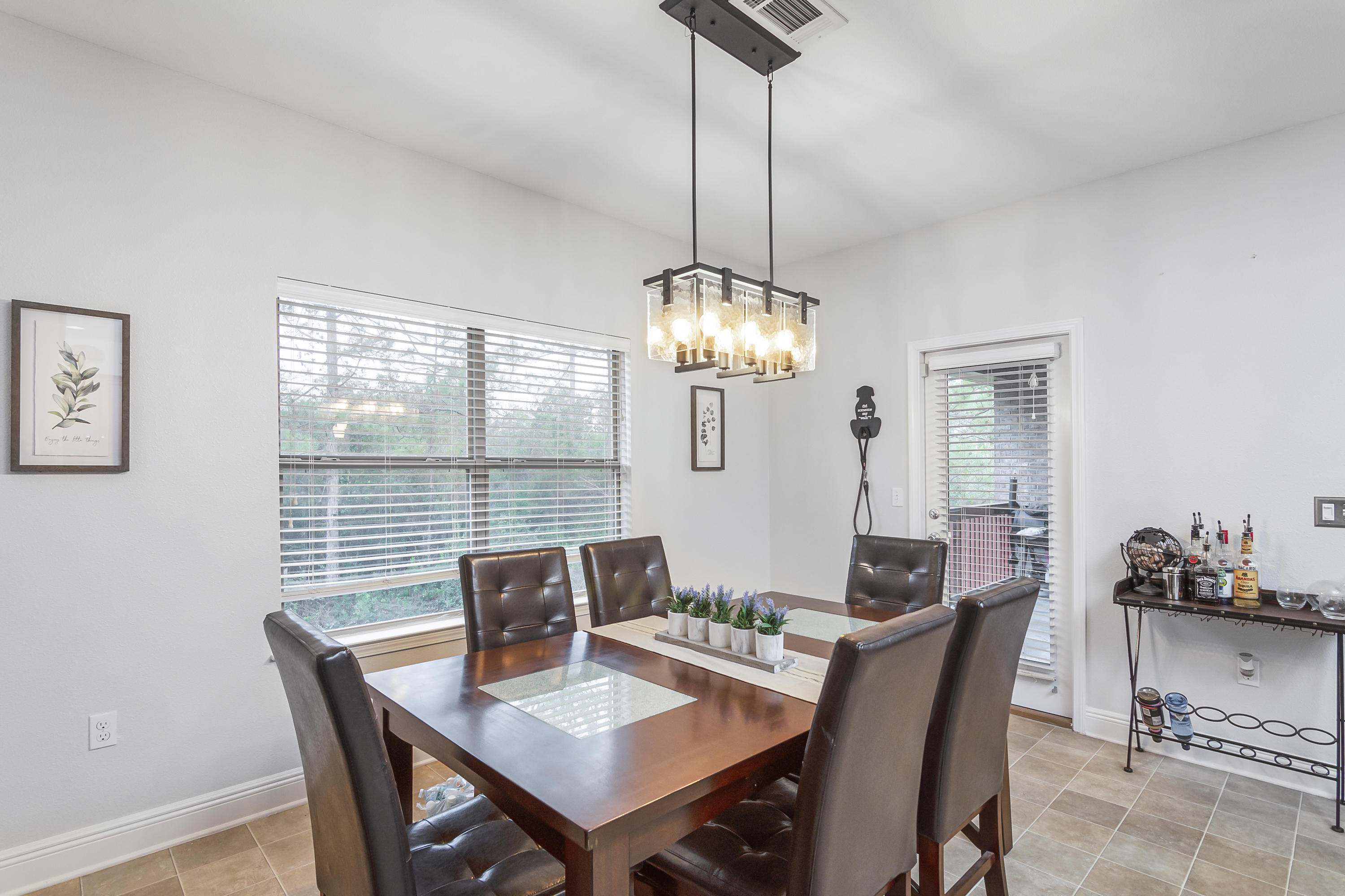 809 Yew Circle Crestview, FL 32536 - Photo 11 of 24 a view of a dining room with furniture window and outside view