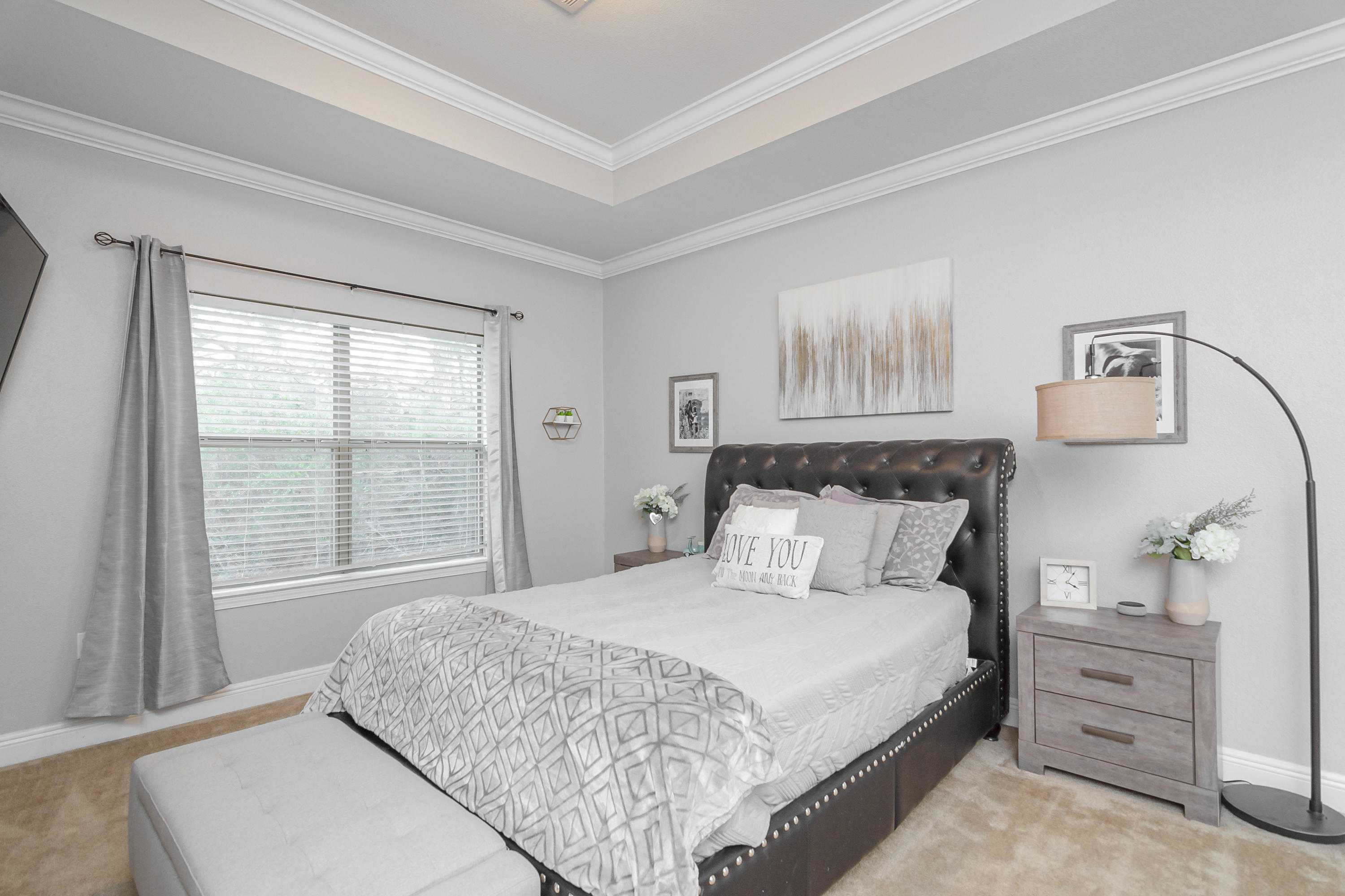 809 Yew Circle Crestview, FL 32536 - Photo 12 of 24 a bedroom with a large bed and a window