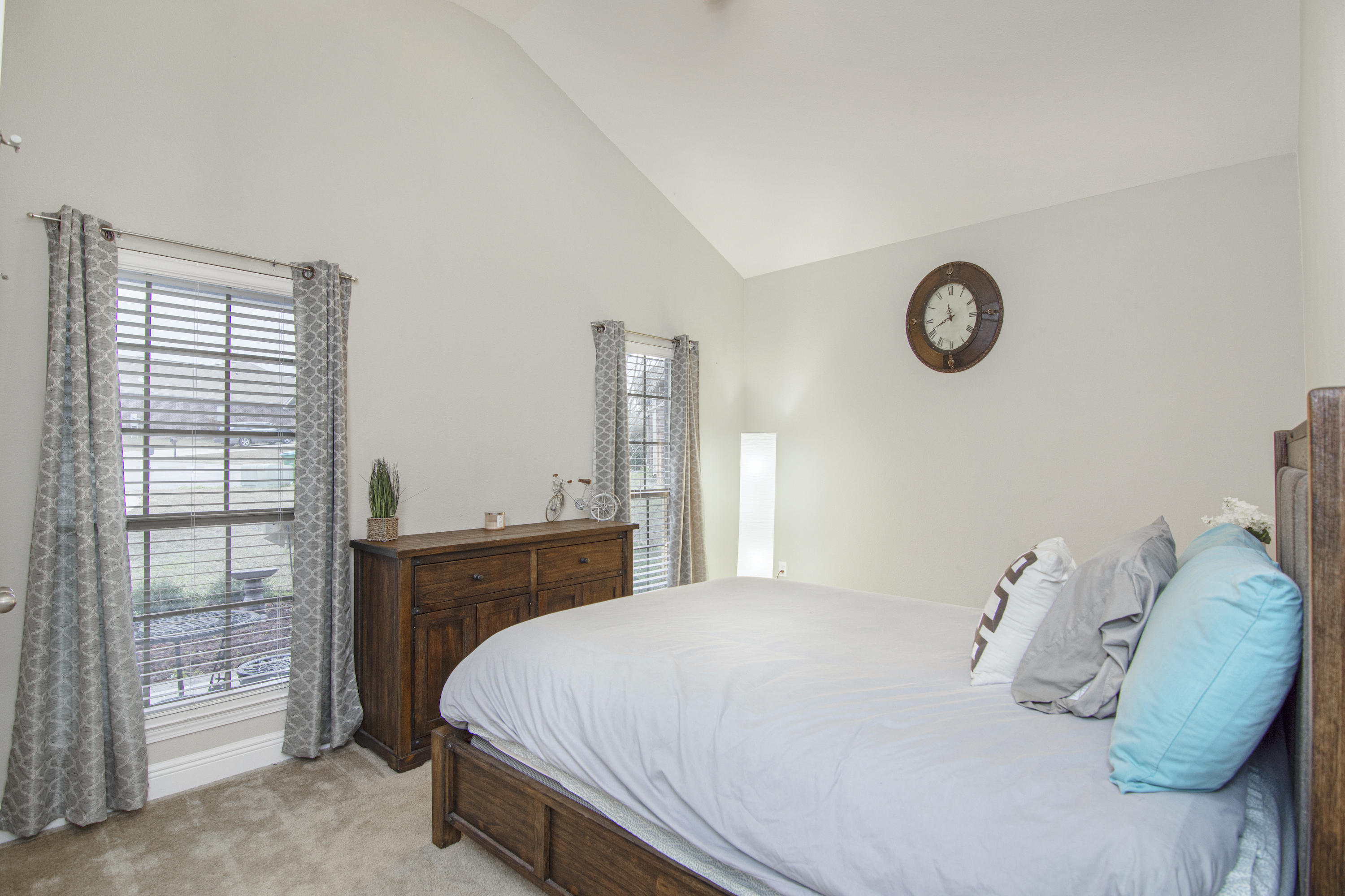 809 Yew Circle Crestview, FL 32536 - Photo 21 of 24 a bedroom with a bed and a window