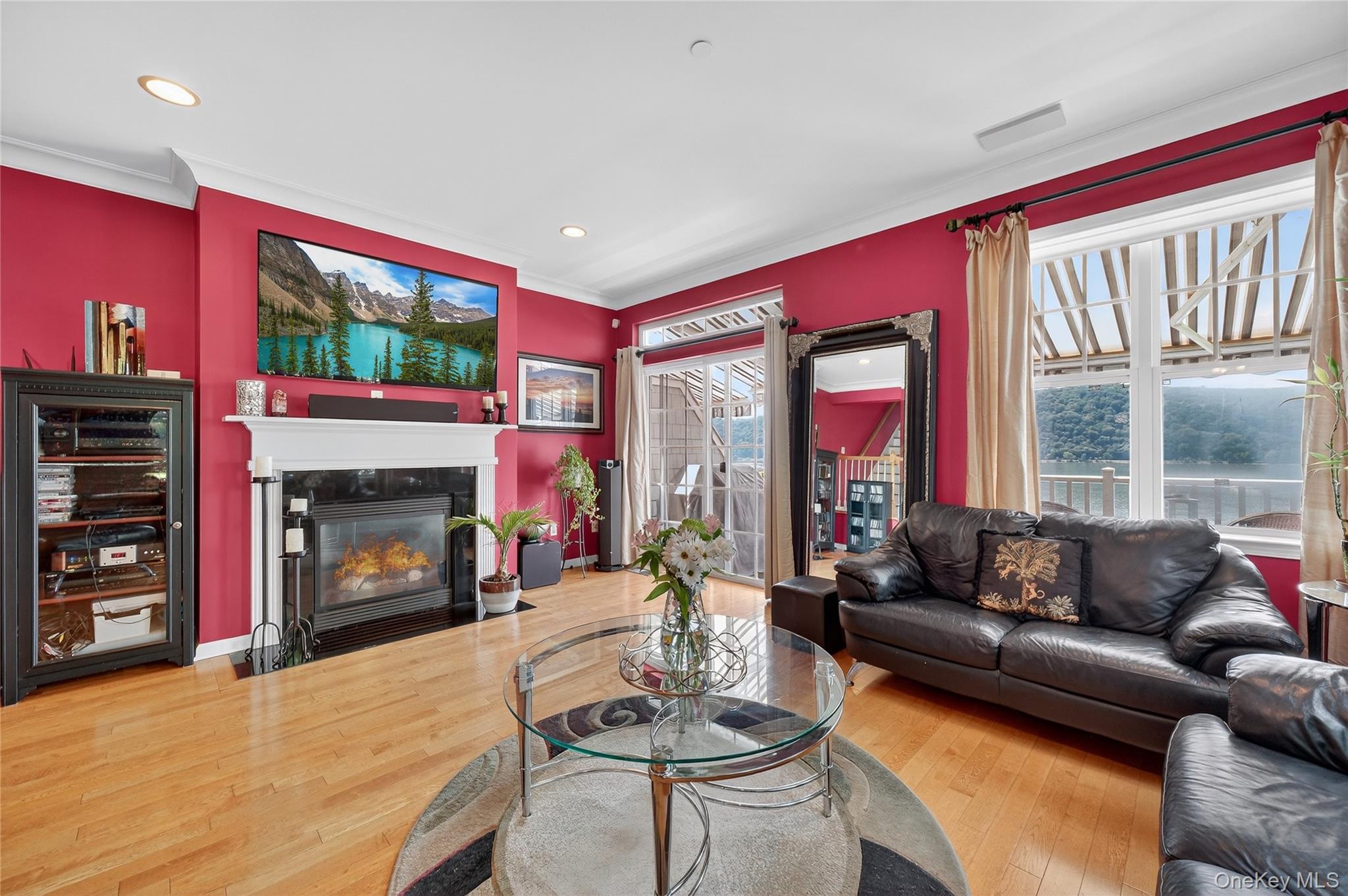 114 Hudson Pointe Drive Poughkeepsie, NY 12601 - Photo 12 of 44 a living room with furniture a fireplace and a large window