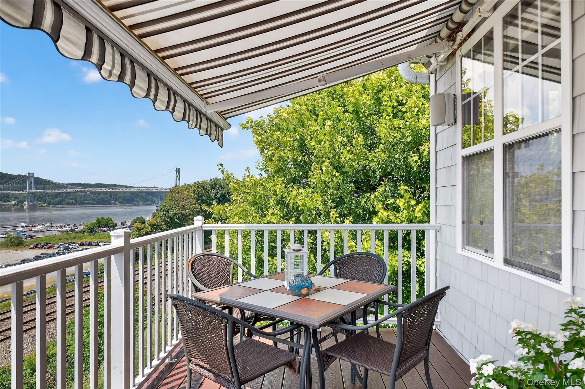 114 Hudson Pointe Drive Poughkeepsie, NY 12601 - Photo 15 of 44 a balcony with wooden floor outdoor seating and furniture