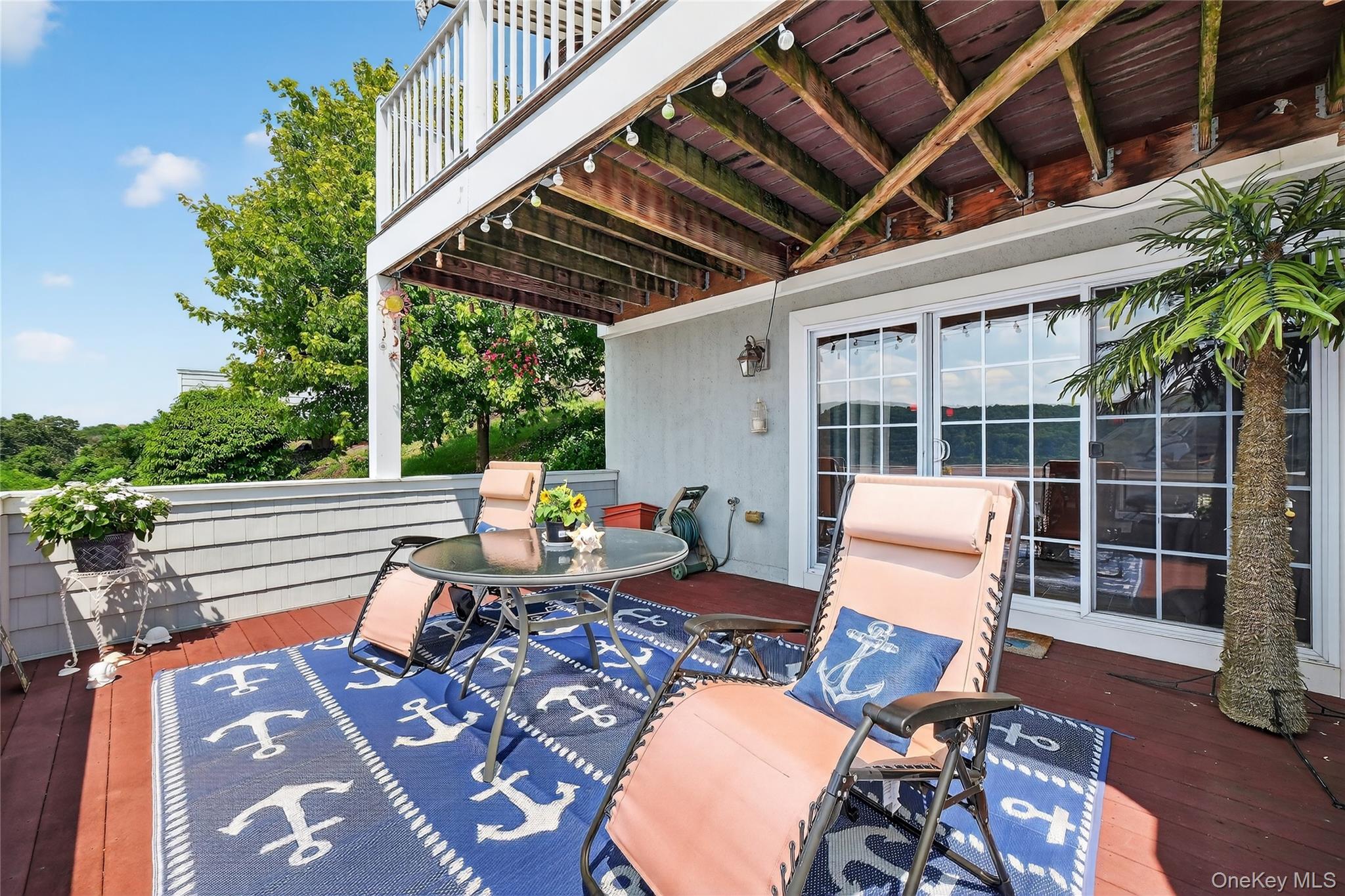 114 Hudson Pointe Drive Poughkeepsie, NY 12601 - Photo 21 of 44 a roof deck with table and chairs and potted plants