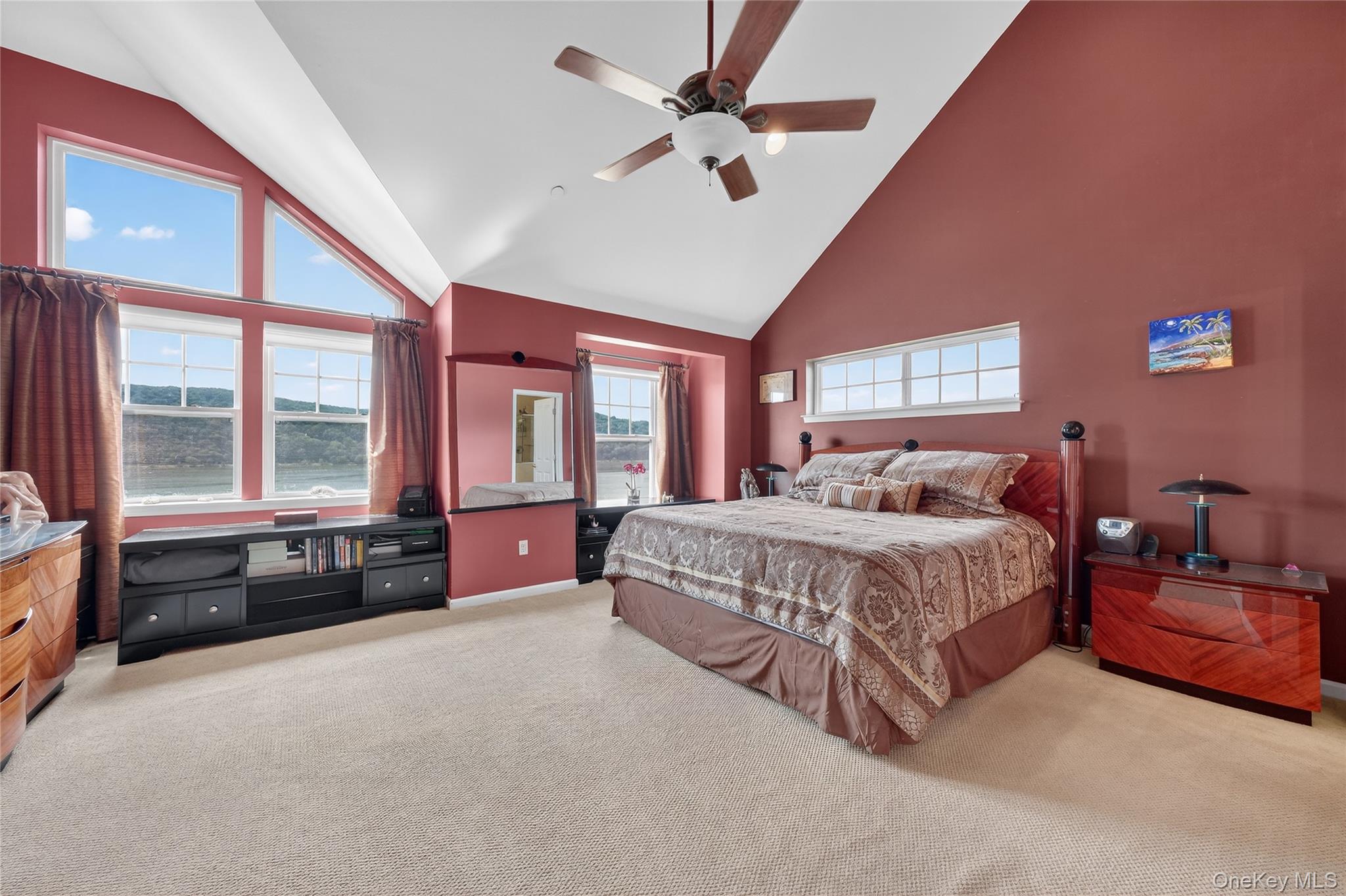 114 Hudson Pointe Drive Poughkeepsie, NY 12601 - Photo 23 of 44 a spacious bedroom with a bed and a chandelier