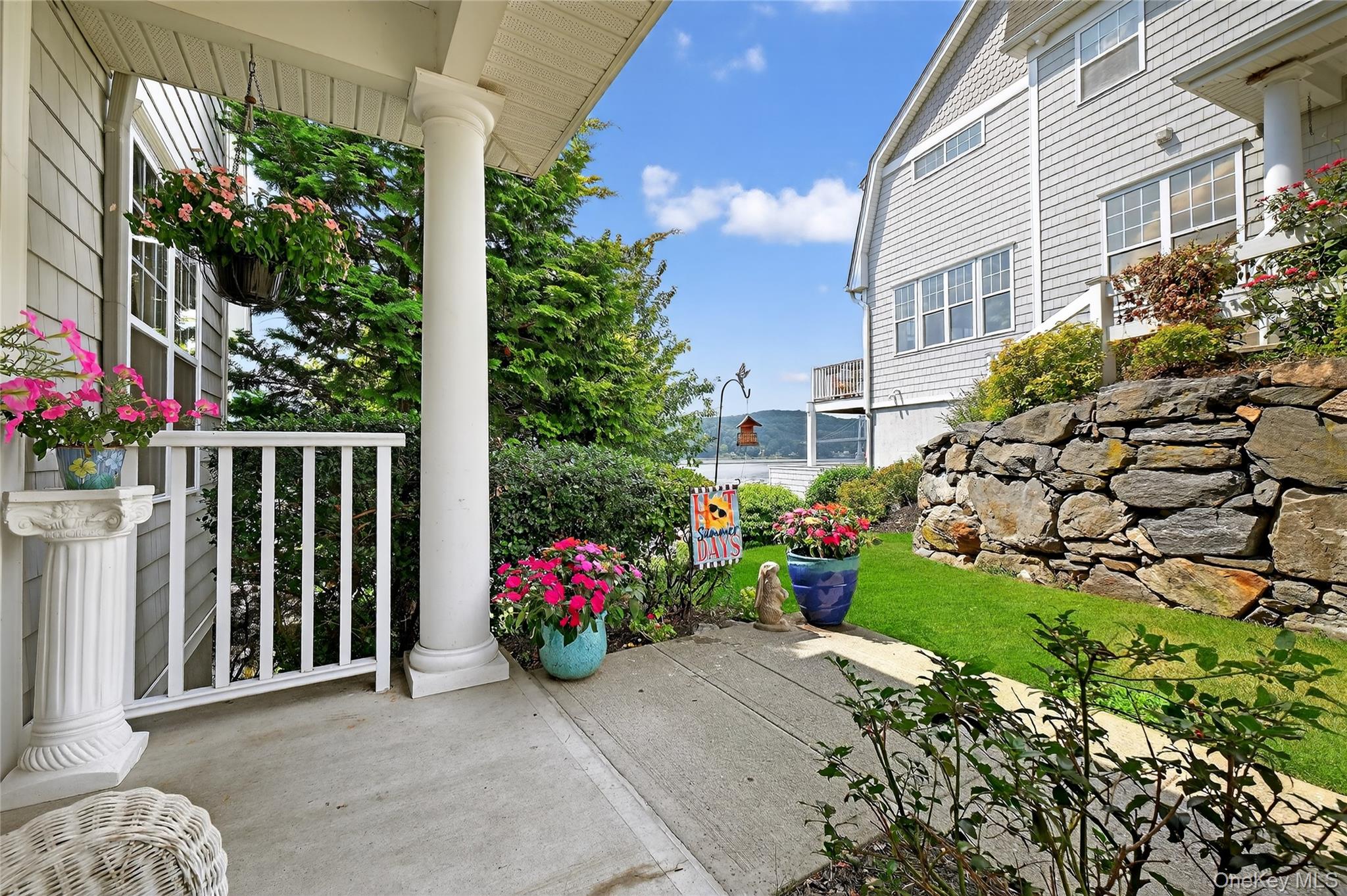 114 Hudson Pointe Drive Poughkeepsie, NY 12601 - Photo 3 of 44 a view of a house with a flower garden