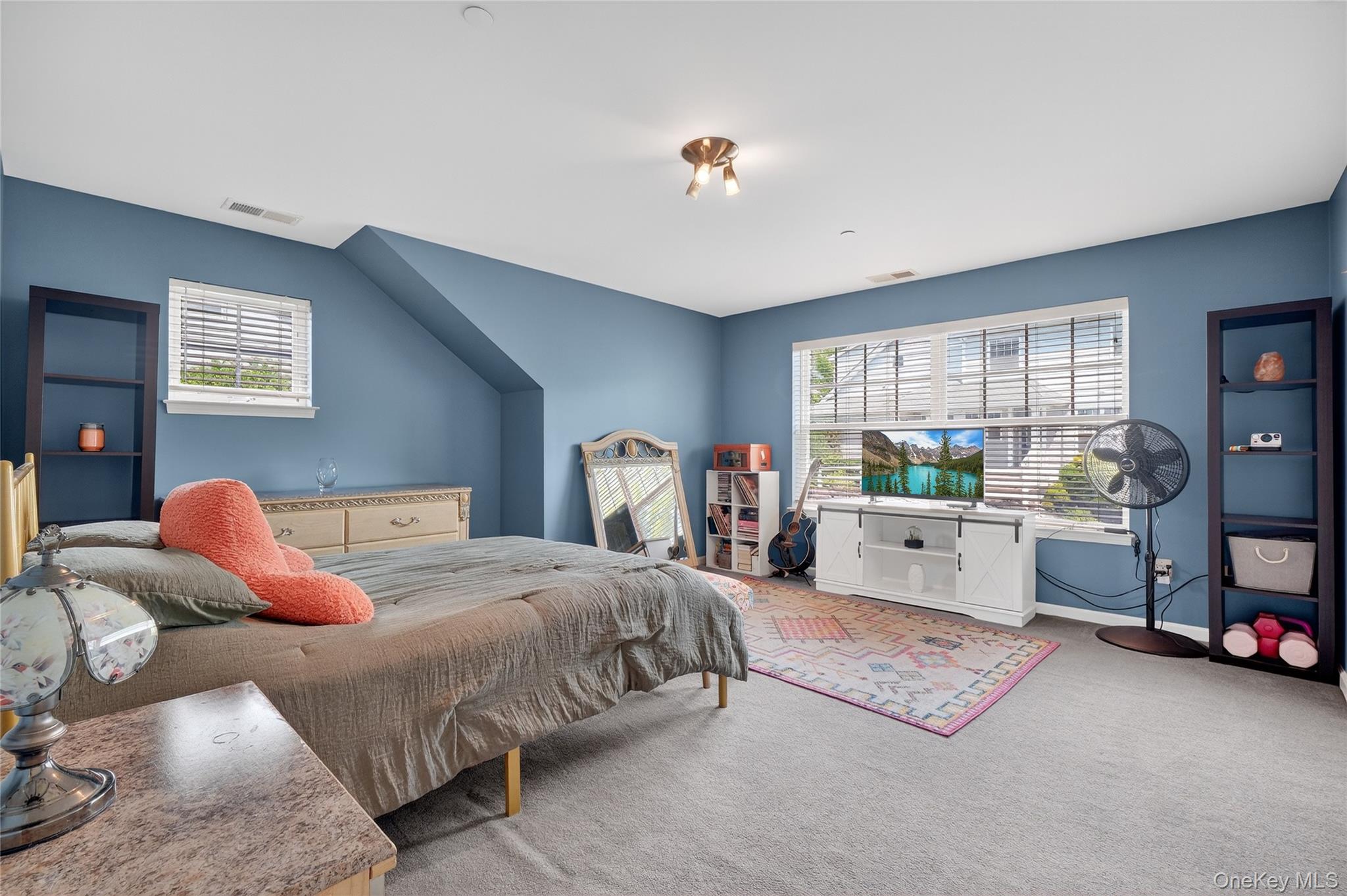 114 Hudson Pointe Drive Poughkeepsie, NY 12601 - Photo 31 of 44 a bedroom with a bed large window with table and chairs