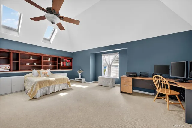 a bed room with a bed and furniture