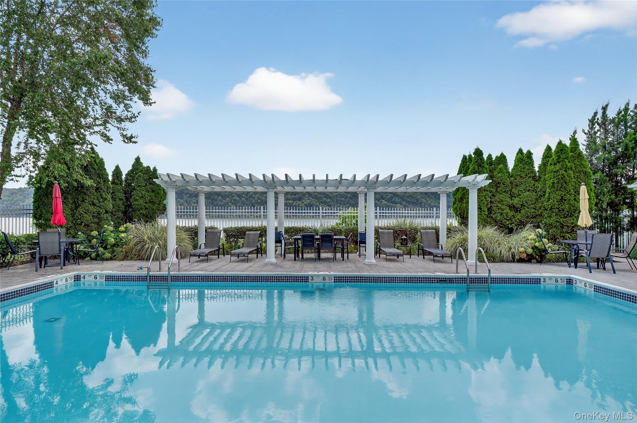 114 Hudson Pointe Drive Poughkeepsie, NY 12601 - Photo 37 of 44 a view of a swimming pool with a patio