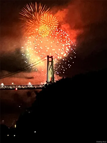 a view of swimming pool with an ocean view