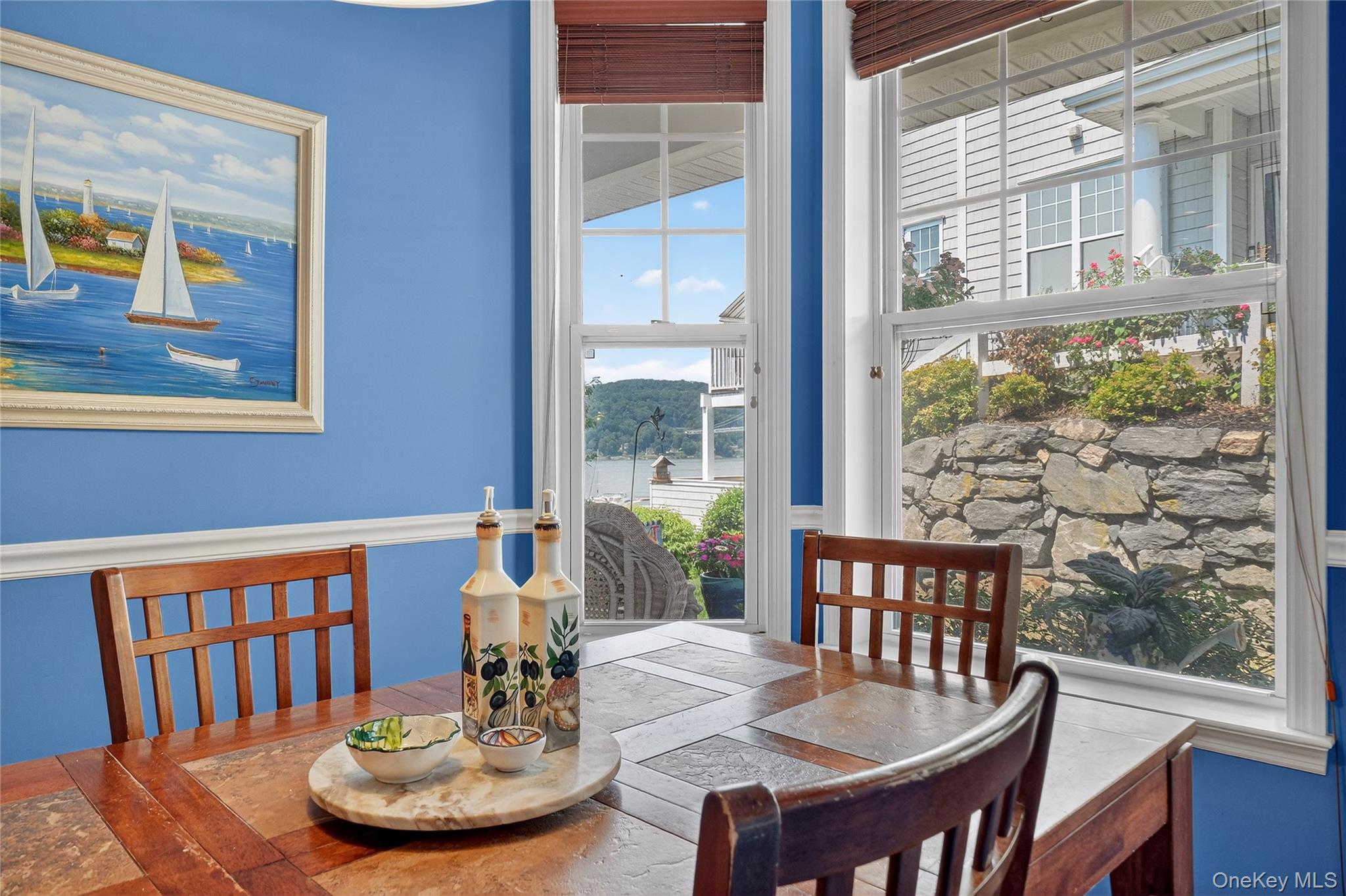114 Hudson Pointe Drive Poughkeepsie, NY 12601 - Photo 7 of 44 a view of a dining room with furniture window and wooden floor