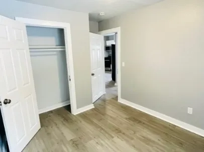 an empty room with closet