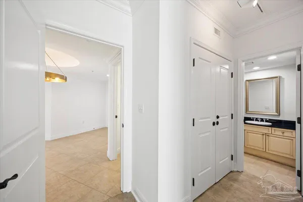 a view of an empty room with a large window