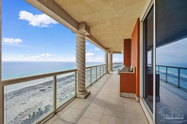 a view of balcony with furniture
