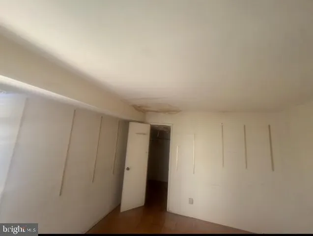 a bathroom with a granite countertop sink