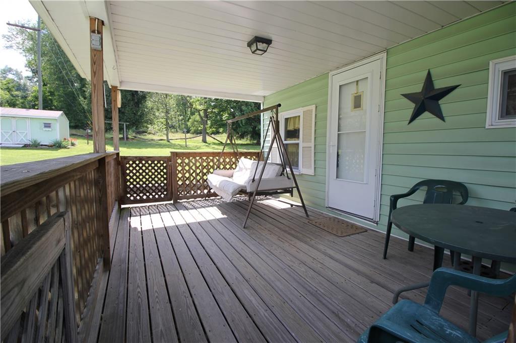 779 Ruffsdale Alverton Road Ruffs Dale, PA 15679 - Photo 10 of 16 COVERED SIDE PATIO