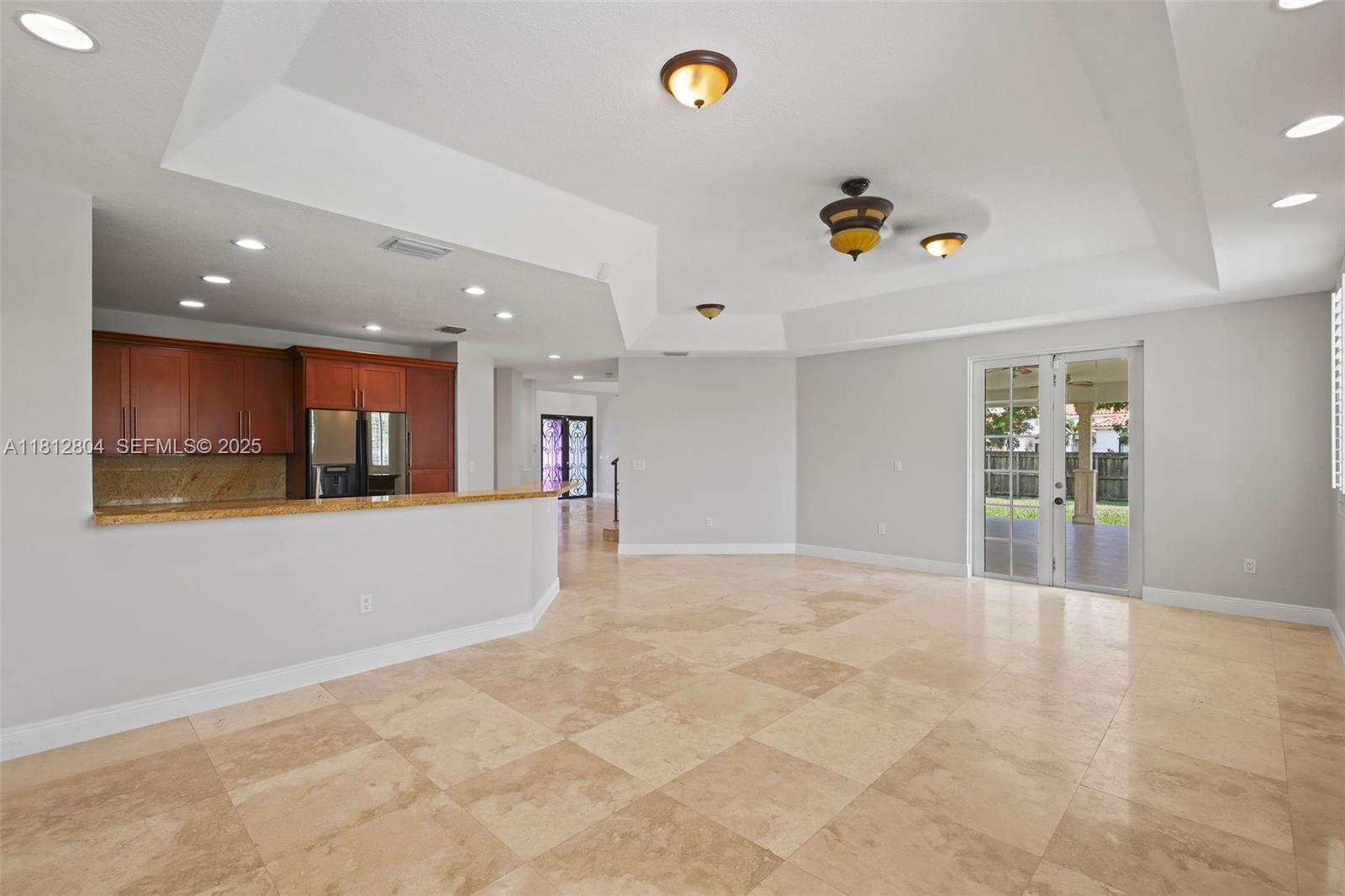 32360 Southwest 204th Avenue Homestead, FL 33030 - Photo 14 of 44 a view of an empty room with a window