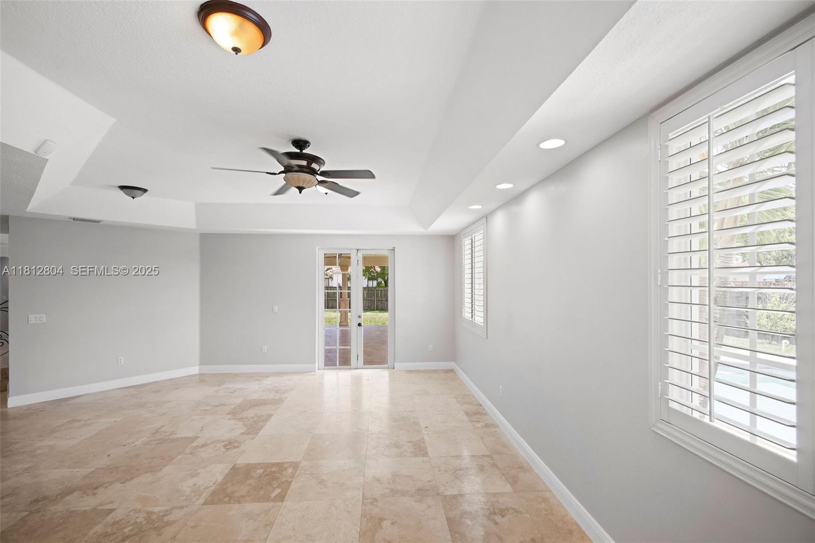32360 Southwest 204th Avenue Homestead, FL 33030 - Photo 15 of 44 a view of an empty room with a window
