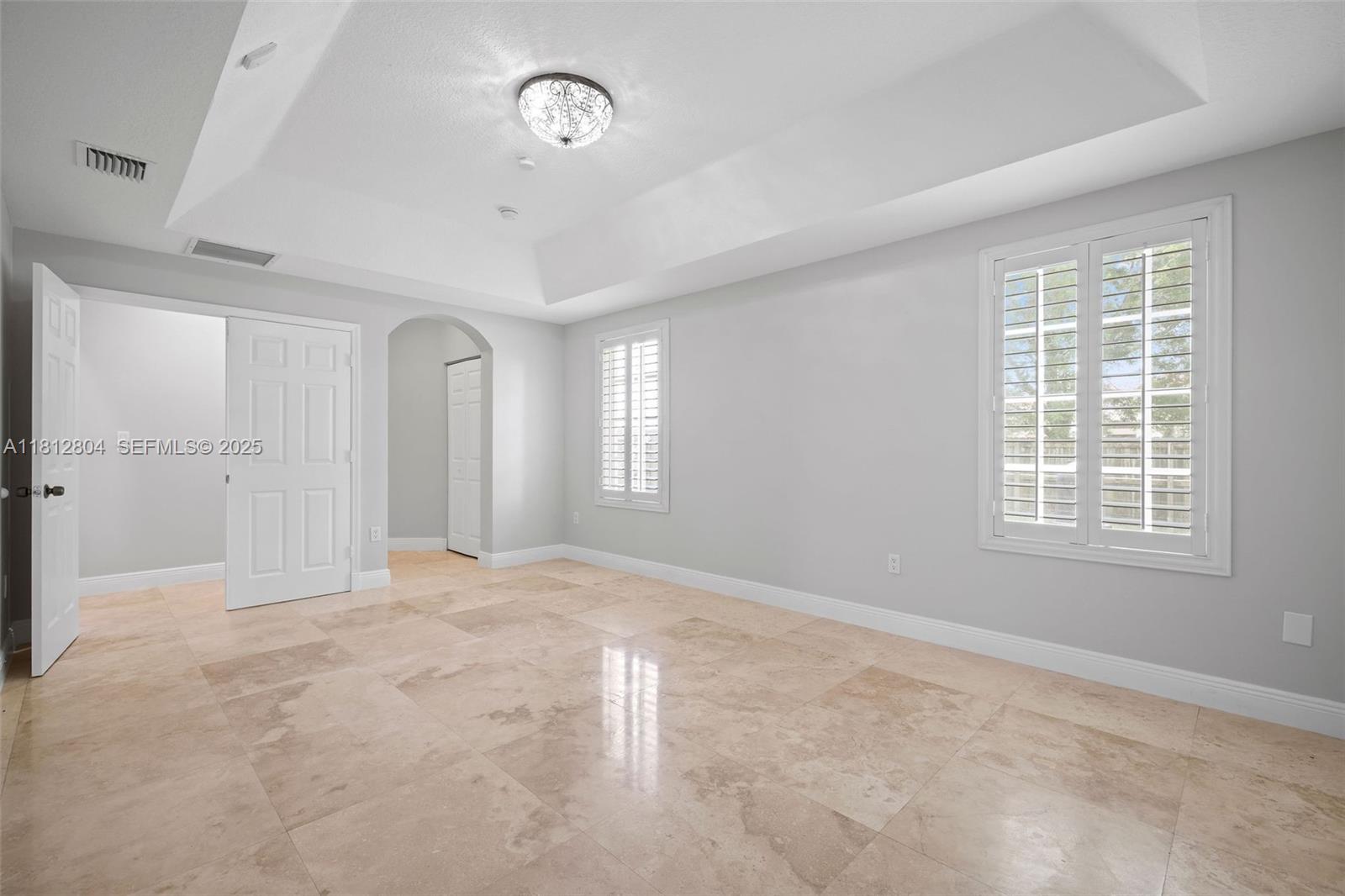 32360 Southwest 204th Avenue Homestead, FL 33030 - Photo 22 of 44 an empty room with windows