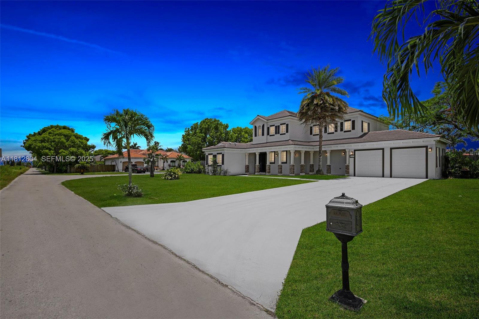 32360 Southwest 204th Avenue Homestead, FL 33030 - Photo 3 of 44 a view of a house with a yard