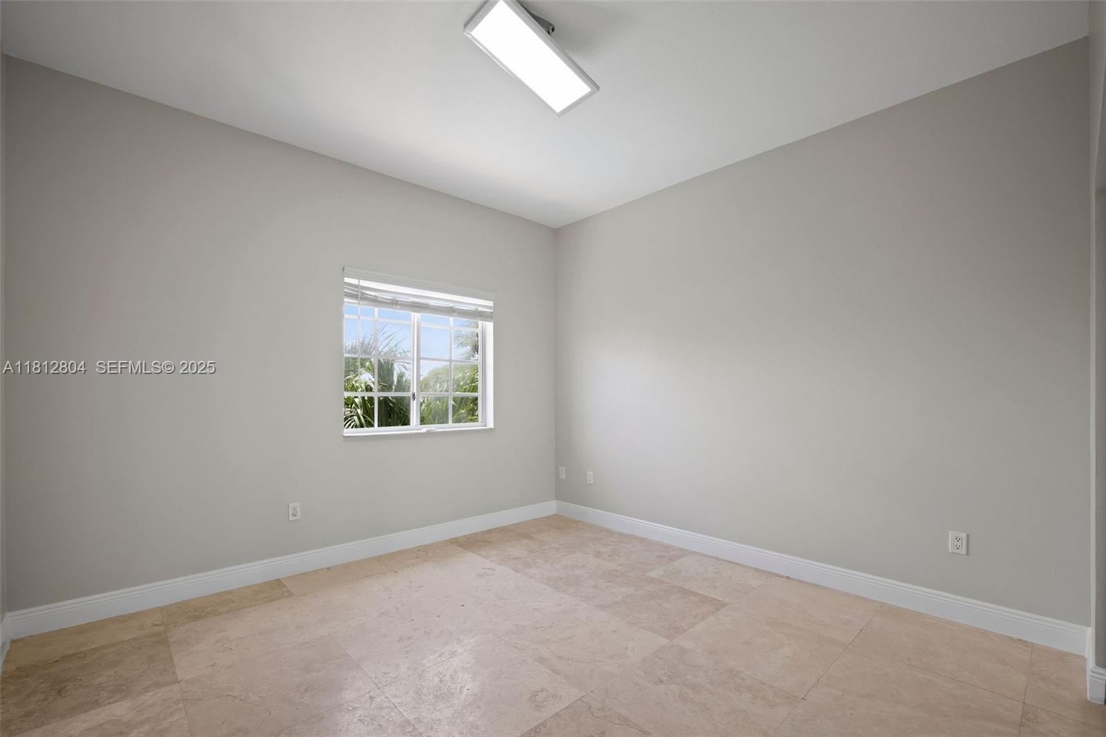 32360 Southwest 204th Avenue Homestead, FL 33030 - Photo 34 of 44 an empty room with windows