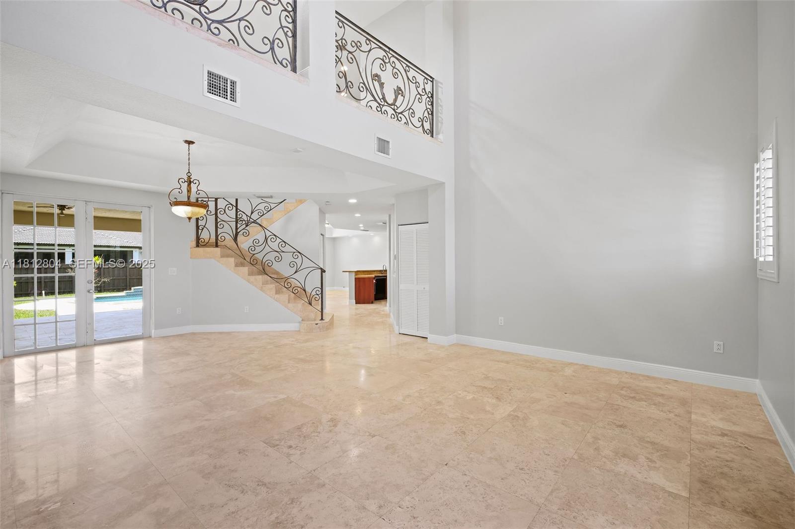 32360 Southwest 204th Avenue Homestead, FL 33030 - Photo 4 of 44 a view of a hallway with entryway