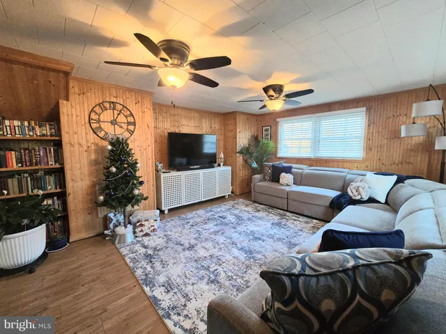 a view of a patio with a table and chairs