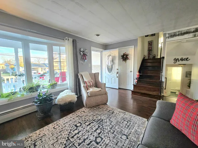 a kitchen with stainless steel appliances a refrigerator sink and cabinets