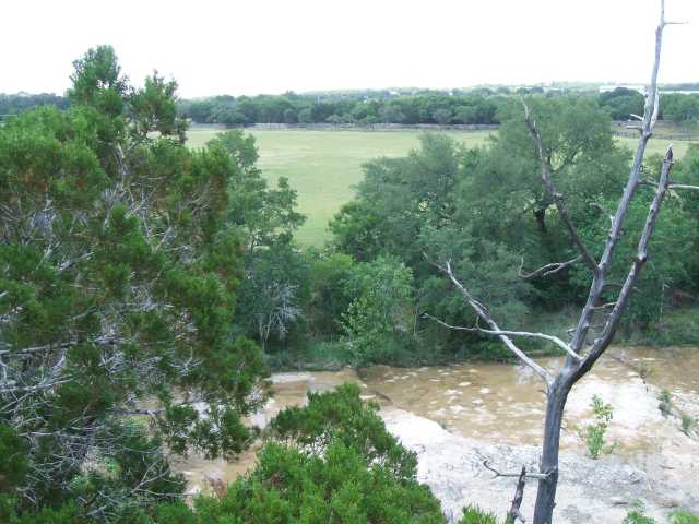 13910 Lone Rider Trail Austin, TX 78738 - Photo 1 of 1 View : Sprawling views over adjacent 1000 acre Austin preserve, waterfalls of YOUR slice of Little Barton Creek, and protected farm land