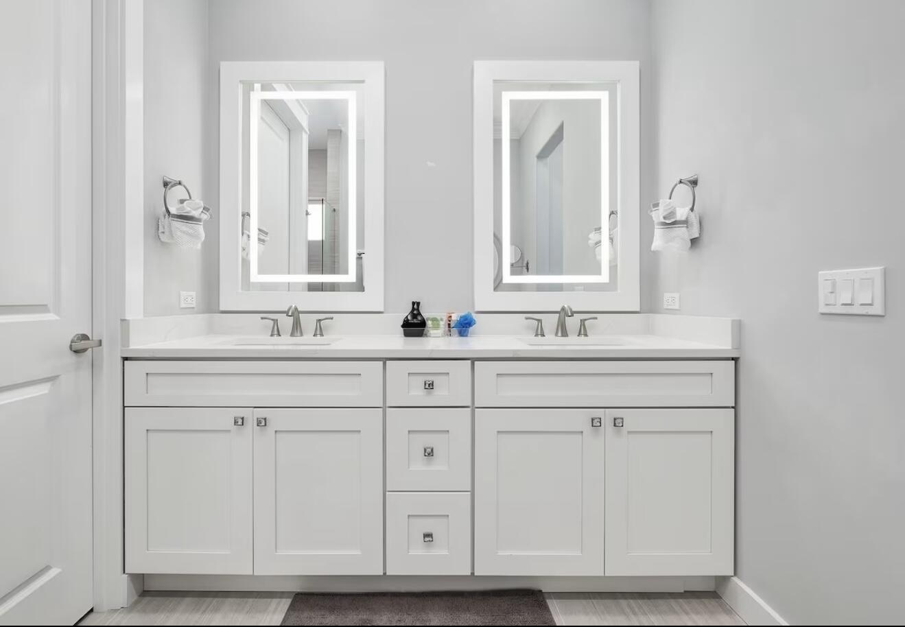 37 Grande Pointe Drive Inlet Beach, FL 32461 - Photo 19 of 58 a bathroom with white cabinets and sink