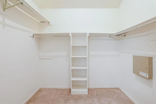 a view of an empty walk in closet