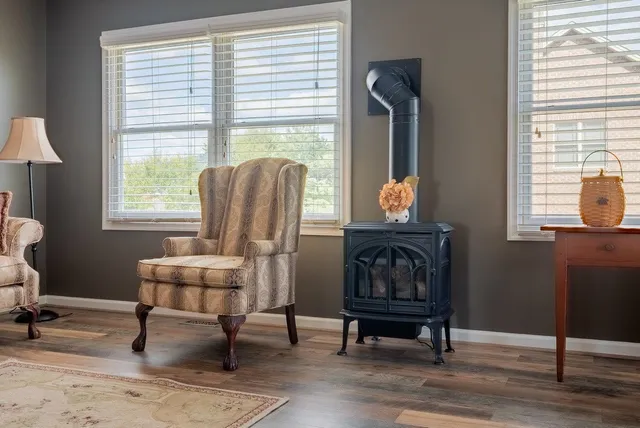 a living room with furniture and a window