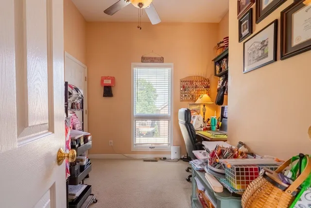 a bed room with a bed and a chandelier