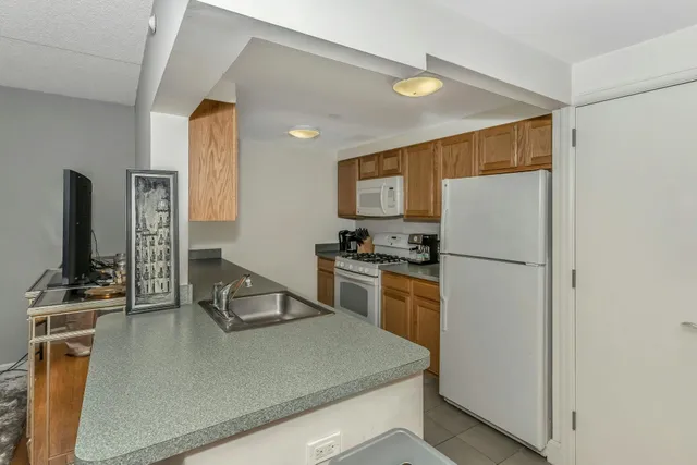 a view of a kitchen area kitchen island furniture and a kitchen
