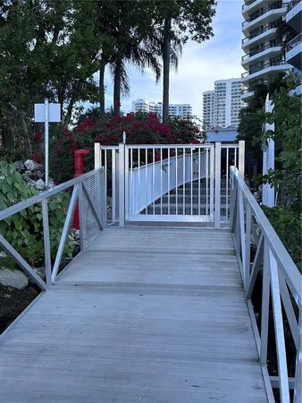 a view of deck with two trees