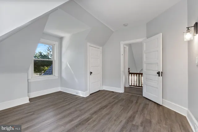 a view of entryway with wooden floor