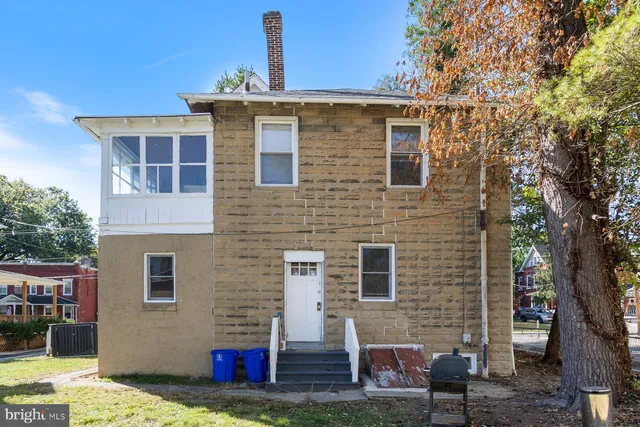 a front view of a house with an outdoor space