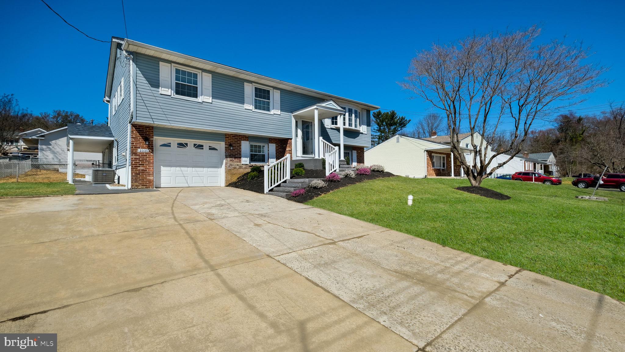 2330 Weir Road Aston, PA 19014 - Photo 2 of 39 a front view of a house with a yard