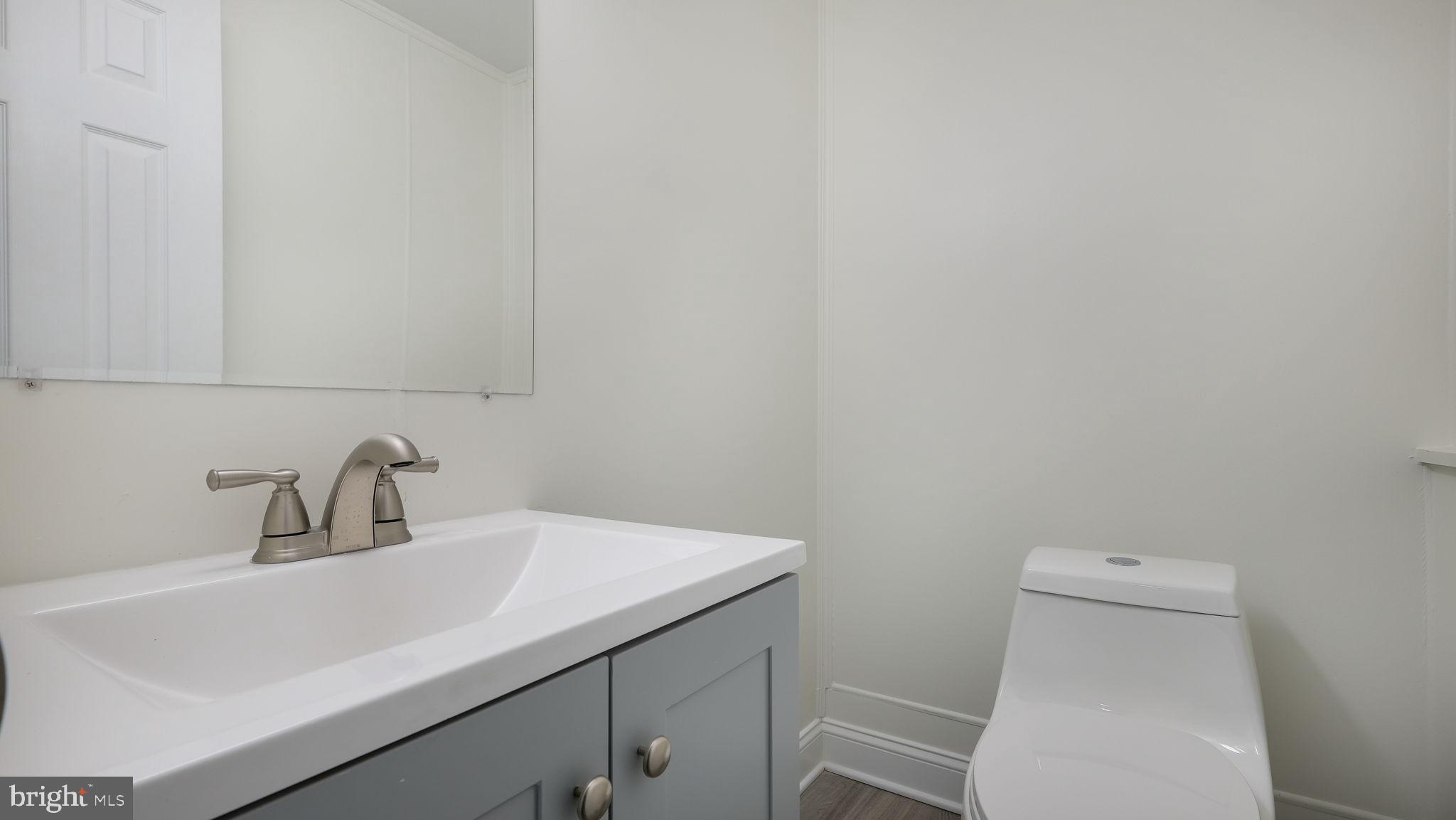 2330 Weir Road Aston, PA 19014 - Photo 31 of 39 a bathroom with a sink and a toilet