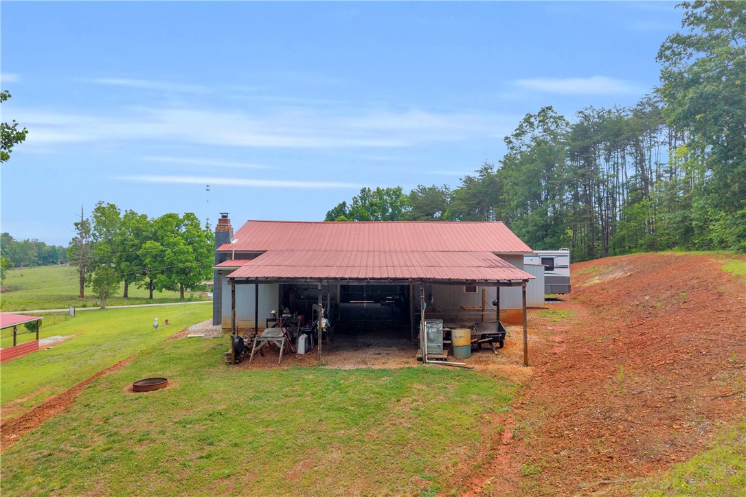 721 Cedar Crest Trail Walhalla, SC 29691 - Photo 33 of 47 A rural retreat with abundant green spaces and a spacious, covered carport.