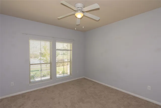 a view of empty room with a window