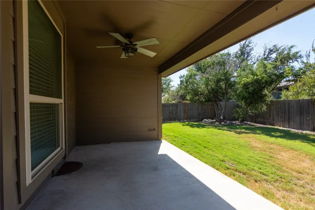 a view of a backyard with a small cabin