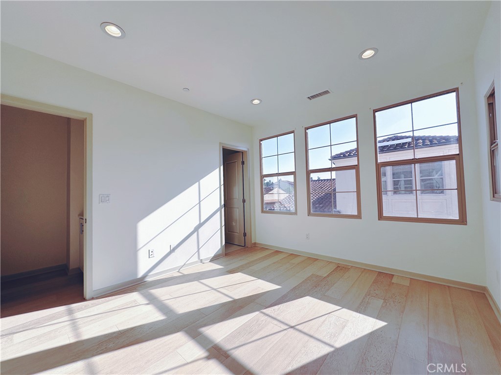 87 Evening Sun Irvine, CA 92620 - Photo 16 of 20 a view of an empty room with a window