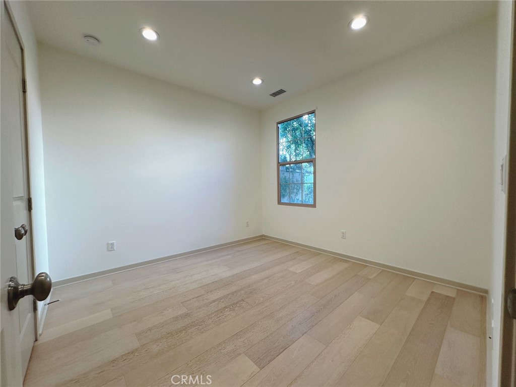 87 Evening Sun Irvine, CA 92620 - Photo 3 of 20 an empty room with windows